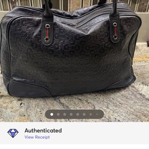 Embossed leather GUCCI weekender